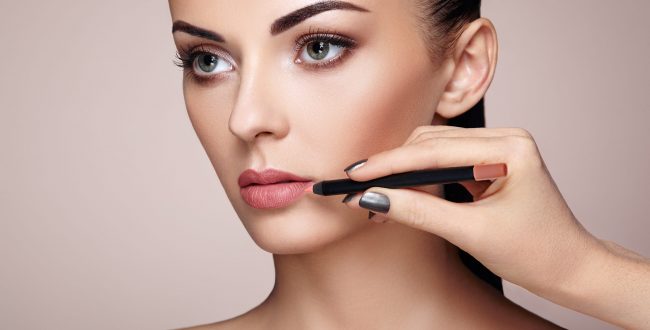 beautiful-woman-paints-lips-with-lipstick-2021-08-26-17-05-19-utc-scaled.jpg